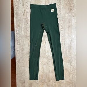 Tracksmith Turnover tights in Green.